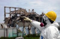 IAEA fact-finding team leader Mike Weightman examines Reactor Unit 3 at the Fukushima Daiichi Nuclear Power Plant. IAEA Imagebank Photo Credit: Greg Webb / IAEA https://creativecommons.org/licenses/by-sa/2.0/